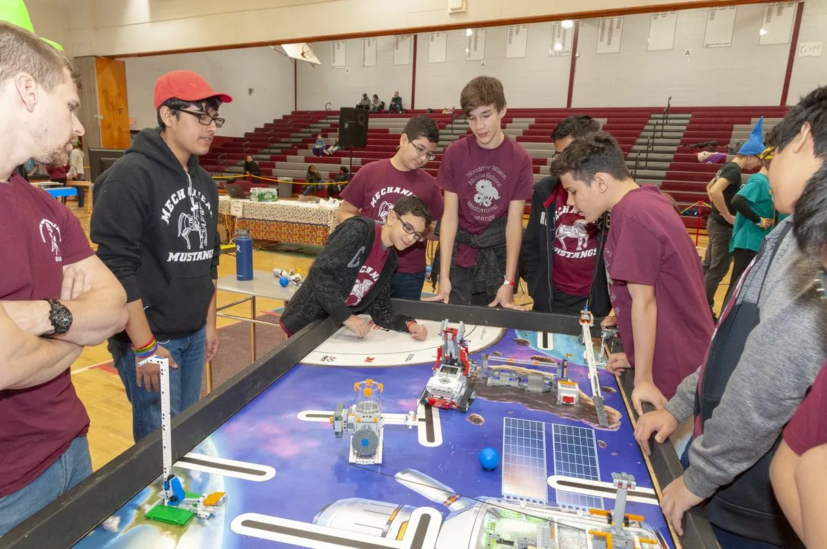 Mentoring an FLL team at the competition table