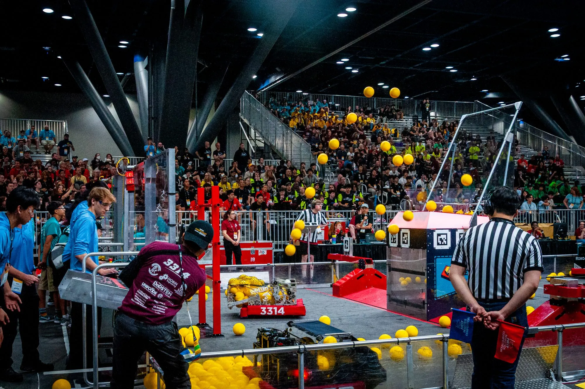 Team 3314 driving in a packed match at the FIRST Championship