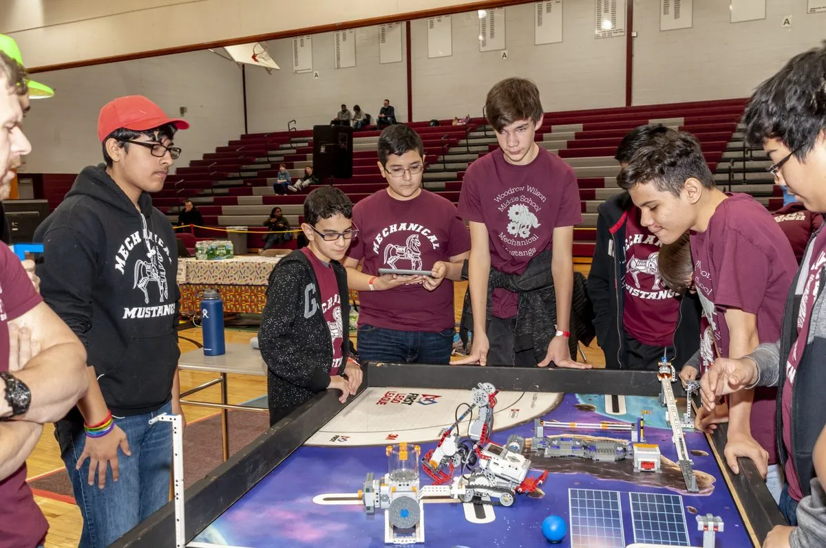 Woodrow Wilson Mechanical Mustangs at the FLL table