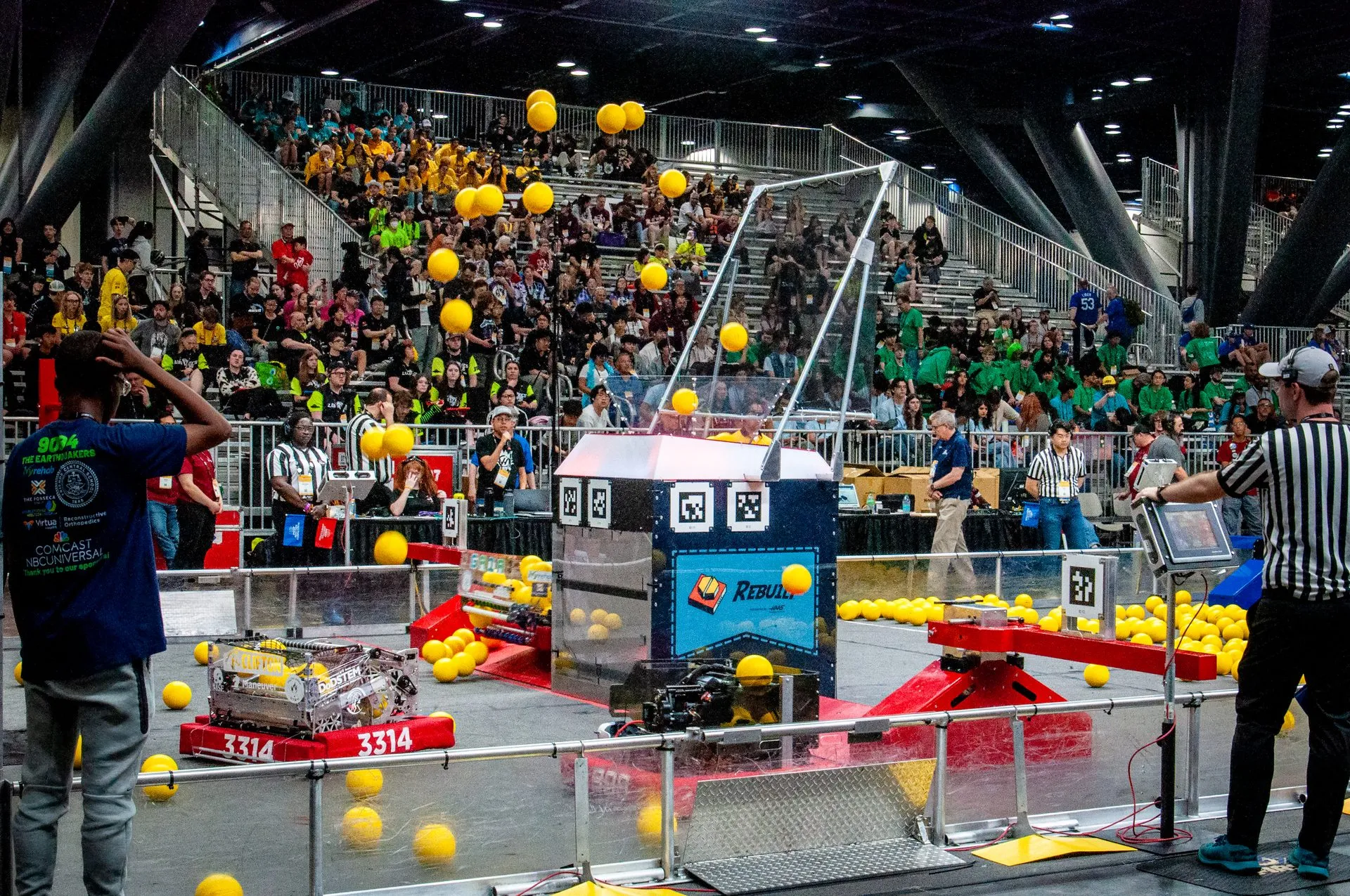 Team 3314's robot competing on the field during a match